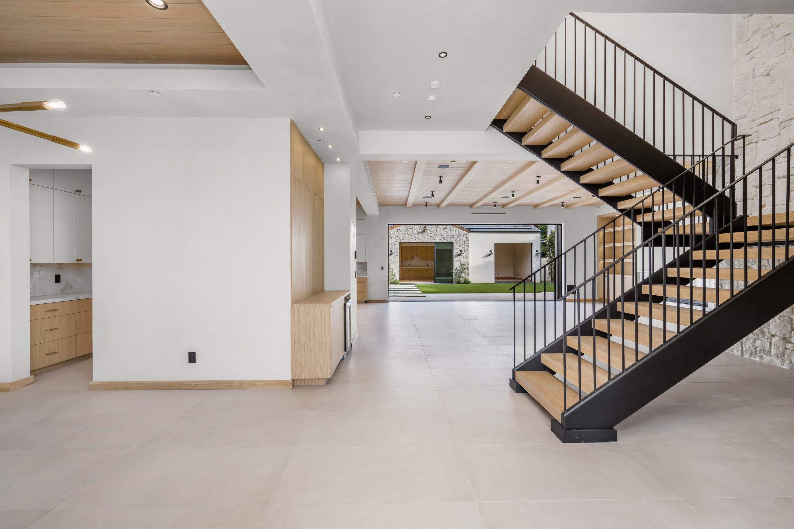 Wooden staircase leading to the second floor of a cozy home